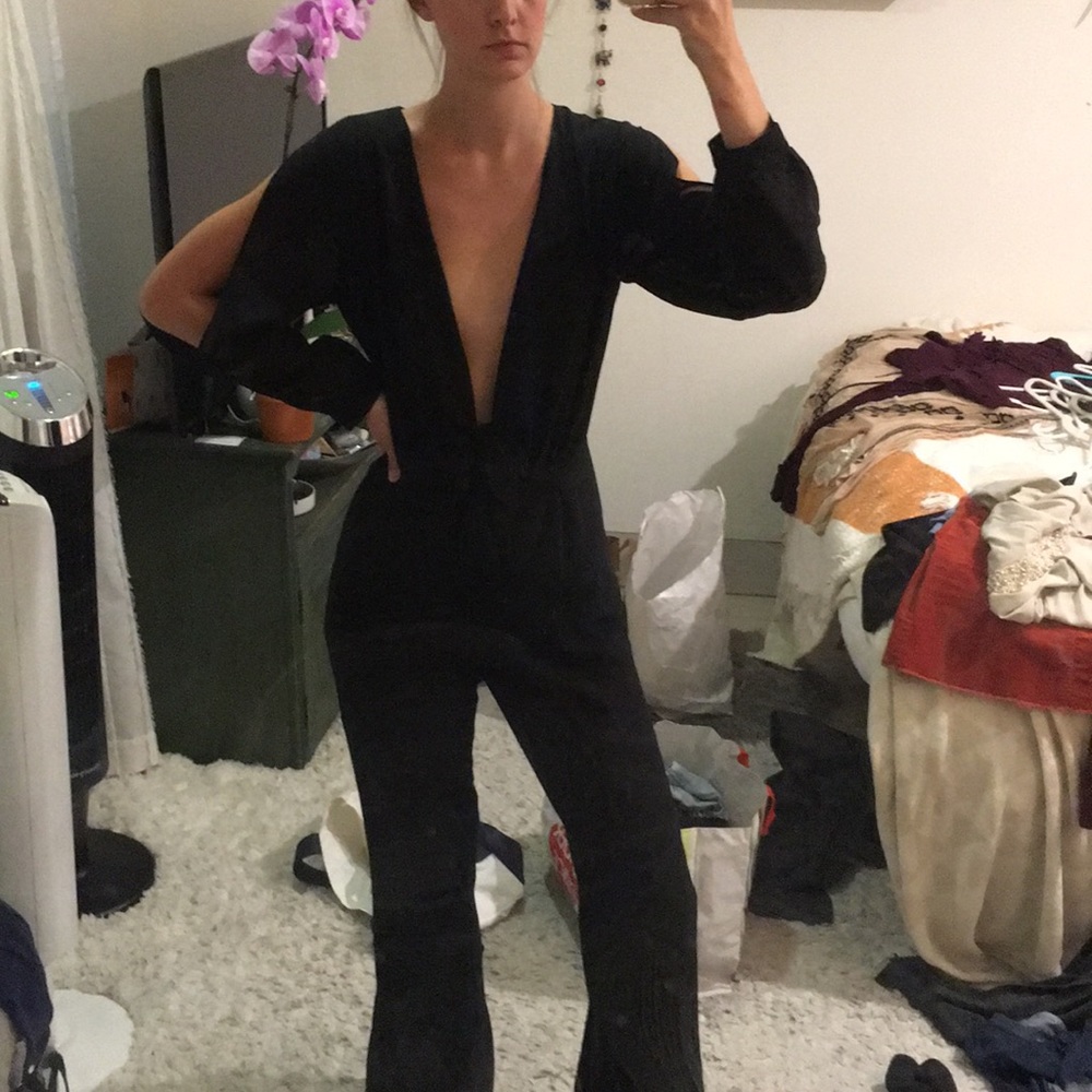 Sophisticated black jumpsuit with tie